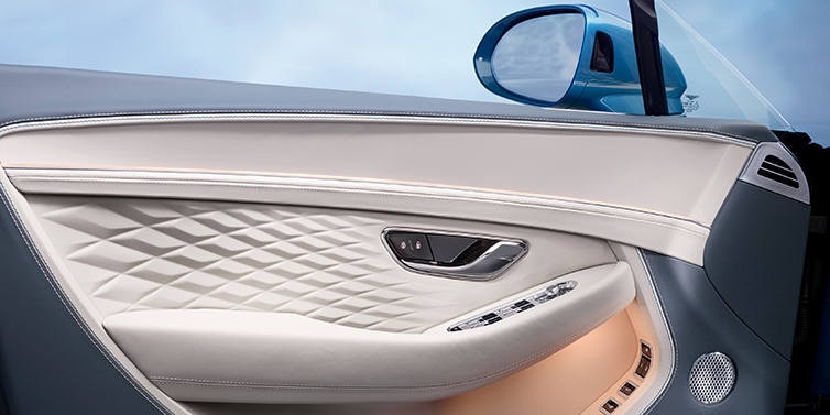 Bentley Al Khobar New Bentley Continental GT Azure coupe door interior featuring Linen and Brunel hides and Piano Linen veneer